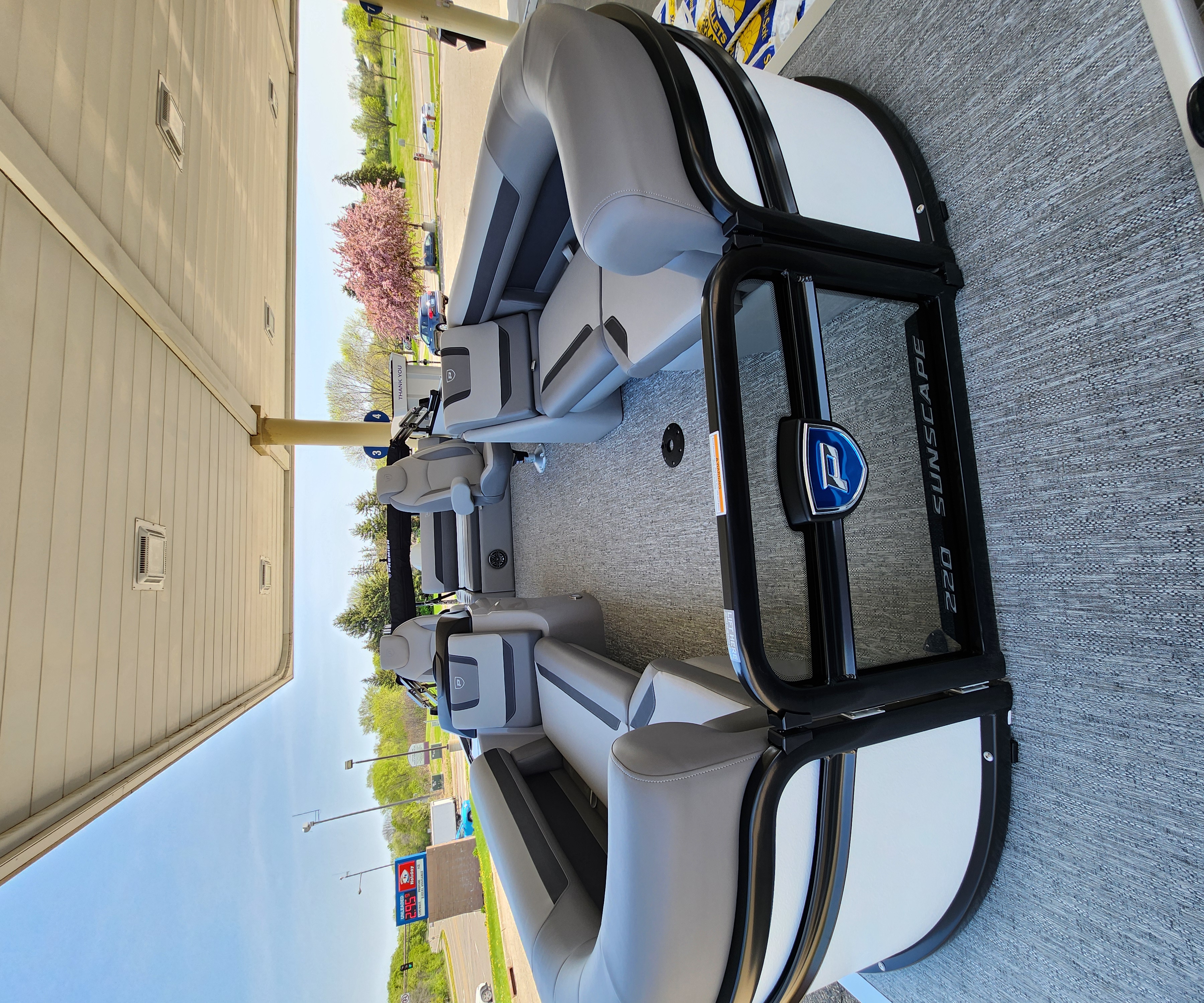 Full view of the spacious gray seating inside the Premier pontoon